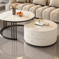 Table basse moderne noire à design rond avec rangement pour salon