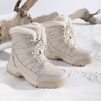 Bottes de neige mi-mollet pour femmes, dessus en cuir avec empiècements, col en fourrure pelucheuse, couleur noir beige, semelle antidérapante à crampons, bottes de randonnée
