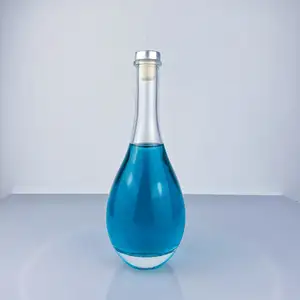 Exquisite Fancy Design Long Neck Embossed Round Shape Vodka Tequila Glass Bottle For Liquor