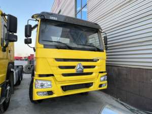 Camion tracteur d'occasion Sinotruk Howo NX 6x4, cabine à toit plat, conduite à gauche, diesel Euro 2, 351-450 CV, 31-40 tonnes, usage intensif - Product Image 1