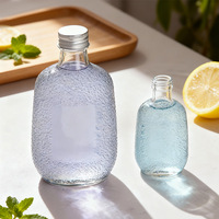 Bouteilles de boisson en verre de conception unique capacités 100ml-500ml forme de cylindre de bouchon à vis pour l'impression d'écran libre d'utilisation de diffuseur