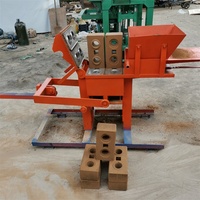 Machine de fabrication de briques en terre argileuse rouge à emboîtement manuel machine à blocs de terre en briques compressées avec logo en argile de petite taille