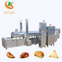 Friteuse industrielle à grande capacité avec filtration automatique de l'huile pour les usines alimentaires de Kuyrdak, de Kazakh Pelmeni et de pâtisseries mixtes