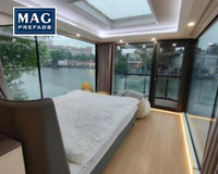 Maison capsule de luxe préfabriquée de haute qualité durable minuscule capsule maison 2 chambres à coucher avec cadre en acier inoxydable assemblage facile