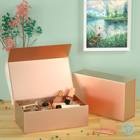 Boîte cadeau en carton magnétique pliable de luxe en papier recyclable rose gold sur mesure en gros pour l'emballage de cosmétiques et de vêtements