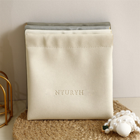 Sac en cuir Pu personnalisé avec impression en relief à presser pour rangement de pièces de monnaie bijoux pochette à bijoux en cuir avec aimant de fermeture