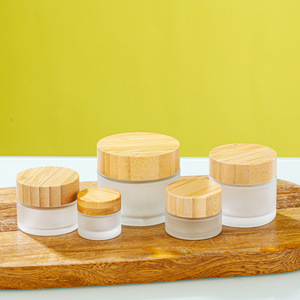 Factory Price Custom Color 5g 10g 15g 20g 30g 50g 60g 100g Face Cream <b>Glass</b> <b>Jar</b> <b>With</b> Bamboo <b>Wood</b> Grain <b>Lid</b> - Product Image 1