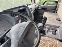 Camion à ordures compacteur d'occasion de 20 mètres cubes à double essieu arrière, châssis Dongfeng, moteur Yuchai, boîte de vitesses rapide à 8 rapports avec réservoir d'eaux usées