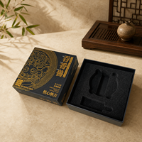 Boîte d'emballage en papier noir personnalisée avec des détails dorés pour le thé, les collations, les souvenirs et les cadeaux culturels