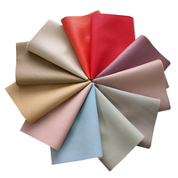 Tissu artificiel à texture litchi de couleur unie et mate avec design uni cuir synthétique décoratif PU en relief pour chaussures/sac/portefeuille