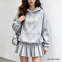 Nouvel ensemble pull à capuche ample et jupe plissée pour femme – Style sport décontracté haut de gamme pour l'automne