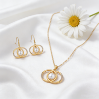 Ensemble de bijoux en laiton plaqué or 18 carats avec zirconiums AAA et double anneau de perles, Joyas De Mujer Hengdian Jewelry Wholesale