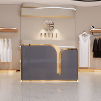 Bureau de réception moderne simple en acier inoxydable Design de magasin de vêtements de mode de luxe haut de gamme Bureau de réception de salon de beauté