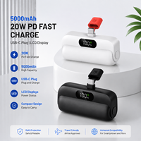Produk Tren 2026 Power Bank Terlaris 5000mAh Mini Capsule 20W Pengisian Cepat USB Layar LED Plug 2-in-1 Portabel OEM