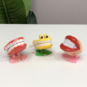 Plástico clásico Mini Clockwork Jump Walk Rotating Tooth Ghost Orange Pumpkin Man Chattering Teeth Prank Halloween Wind Up Toy - Product Image 2