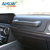 Accessoire intérieur en fibre de carbone véritable, panneau de commande central, poignée du copilote pour Mercedes-Benz Classe G W464 G63 G500 2019-2023