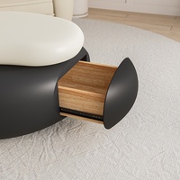 Table basse rotative en forme de galet |   Table de style crème moderne en gros d'usine avec rangement pour salon