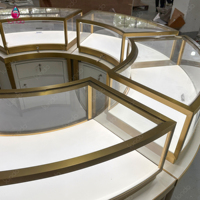 Vitrine d'îlot ronde pour bijoux Sundo, comptoir en verre incurvé, présentoir crème doré, fabricant de mobilier modulaire pour magasins