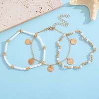 Ensemble de 3 bracelets tendance or et blanc avec breloques coquillages, chaînes et perles – Cadeau d'été pour femme