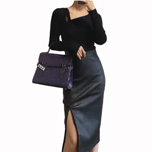 新しい秋冬の女性のセクシーなオフィスウェア通勤スタイルのスタイリッシュなレザーラップスカート