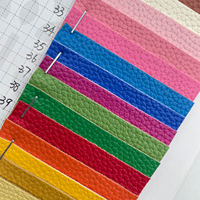 Tissu synthétique extensible en cuir PU motif litchi 1,2 mm avec support tricoté élastique pour vestes, robes et vêtements