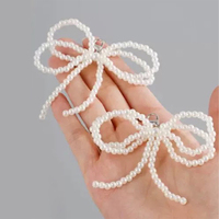 Nouveaux accessoires et bibelots tendance : Cintres à franges avec nœud perlé