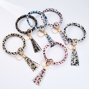 Hot Selling PU Leather Tassel Bracelet Wristbands Keychain Manufacturer Wholesale Fashion Tassel PU Leather <b>Wristlet</b> Keychain - Product Image 1