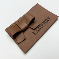 Étiquettes de vêtements personnalisées écologiques en relief/imprimées (cuir PU/cuir microfibre/cuir véritable) pour vêtements, sacs, chaussures