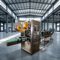 Machine d'étiquetage des manchons pour bouteilles, canettes, emballages en plastique et en verre