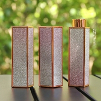 Étui à rouge à lèvres rectangulaire scintillant emblématique Or rose Emballage de luxe à paillettes 2026 Contenant cosmétique vide professionnel en gros LUMI