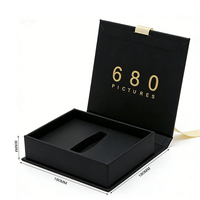 Boîte à bijoux élégante personnalisée en carton noir en forme de livre, avec estampage à chaud, emballage cadeau en papier, boîte avec logo et poignée en ruban