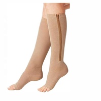 Chaussettes de compression noires décontractées au genou avec fermeture à glissière et bout ouvert 20-30mmHg pour le traitement des varices et de l'œdème