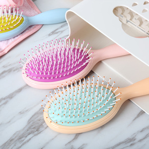 Peigne de massage du cuir chevelu Baihe Candy Color Fragrance Air Cushion avec manche en plastique, perles en nylon et design élastique - Product Image 3