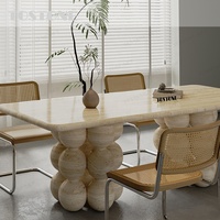 Table à manger en marbre travertin naturel super blanc Tostone Designer, base en pierre multi-sphérique pour la décoration de la salle à manger à domicile