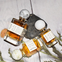 Bouteilles de parfum à sertir personnalisées 50ML 100ML Bouteille rectangulaire irrégulière en verre transparent Bouteille de parfum vide avec boîte