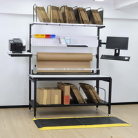 Table d'emballage réglable avec accessoires modulaires et rangement pour l'emballage en entrepôt, fabricant OEM