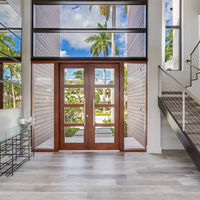Porte d'entrée double moderne en aluminium avec double vitrage et serrure de sécurité pour projets résidentiels