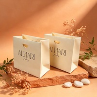 Sac de shopping en papier crème de luxe avec impression de logo personnalisé pour bijoux, emballage cadeau, présentation de bijoux