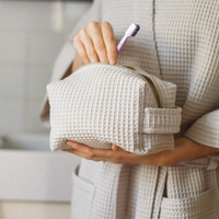 Pochette cosmétique personnalisée en tissu gaufré, sac à maquillage moelleux à motif damier, pochette cosmétique portable avec poignée