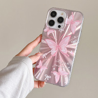 Coque de protection pour iPhone 15 Pro Max avec nœud papillon et effet laser Aurora, motif papillon rose, nouvelle collection