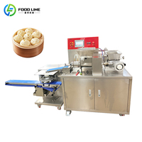 Machine commerciale automatique pour la production de dim sum et de soup dumplings cuits à la vapeur