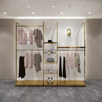 Porte-vêtements en métal MDF doré tendance pour femmes pour la décoration de magasin