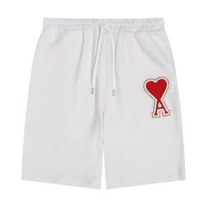 Nuevos pantalones deportivos de marca a la moda para el verano, pantalones cortos holgados y versátiles con bordado para hombre y mujer, pantalones cortos AMI para parejas - Product Image 6