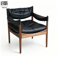 Fauteuil de salon de style mid-century en cuir véritable, rembourrage en éponge douce, design ergonomique, structure en bois massif durable, fauteuil décontracté noir
