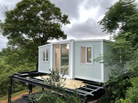Maisons conteneurs multifonctionnelles en panneaux sandwich préfabriqués en acier - Écologiques, alimentées à l'énergie solaire, résistantes au feu, pour écoles et salons