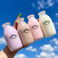 Jouet Squishy en forme de bouteille de lait, 4 couleurs, Macarons Kawaii, jouet à presser en forme de bouteille de thé au lait, cadeau pour fille avec perles