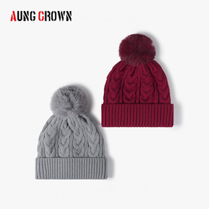 Aung Crown <span class=keywords><strong>Bonnet</strong></span> à pompons tricoté à la mode Vente en gros <span class=keywords><strong>Bonnet</strong></span> d'hiver chaud doublé en <span class=keywords><strong>polaire</strong></span> pour le <span class=keywords><strong>sport</strong></span> en plein air Tenue décontractée - Product Image 1