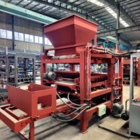 Machine de moulage automatique hydraulique pour blocs emboîtables, facile à utiliser, pour la fabrication de briques creuses en ciment 4-15