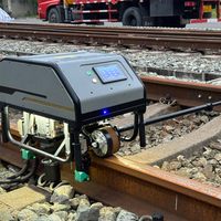 Robot de serrage de boulons ferroviaires entièrement automatique avec reconnaissance de positionnement et serrage de boulons par commande à une touche