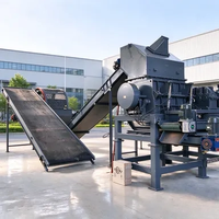 Broyeur de pneus industriel à double arbre avec lames de broyage pour pneus usagés